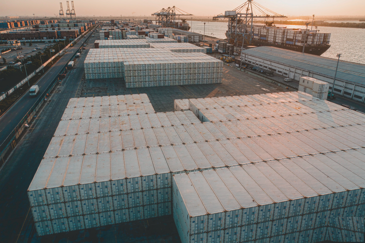Reefer containers stacked at a modern port terminal for frozen seafood cold-chain logistics
